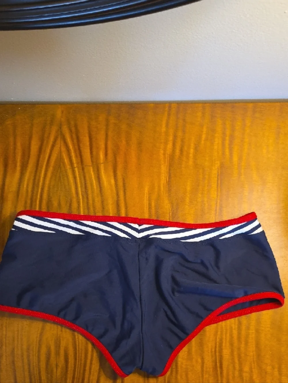 Men's Navy Swim Trunks with Red Trim and White Stripe Detail UNIQUE V CUT OUT - Picture 5 of 5